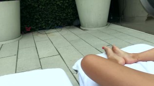 Hot girl masturbating by hotel pool